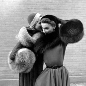 ladies with dior fur muffs