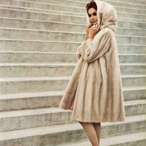 Model in Tourmaline EMBA hooded mink coat by Christian Dior, photo by Georges Saad1961